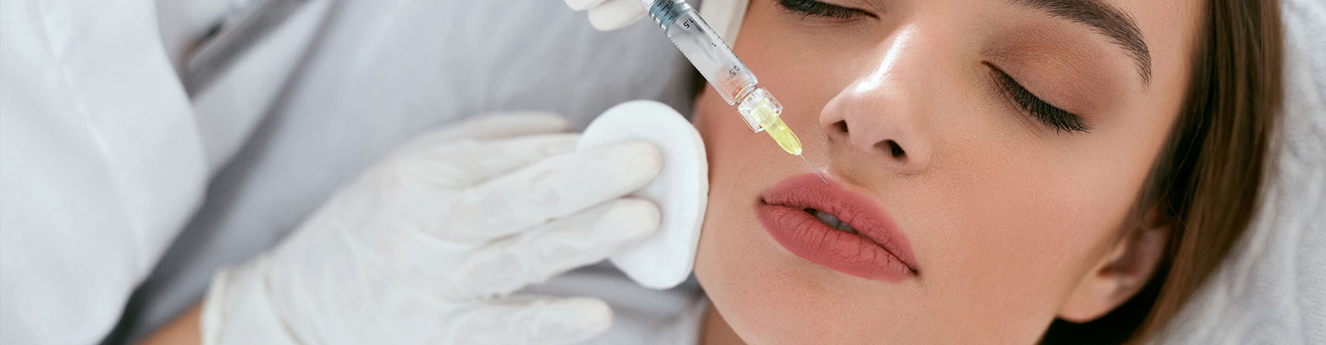 Woman Getting Beauty Injection For Lips
